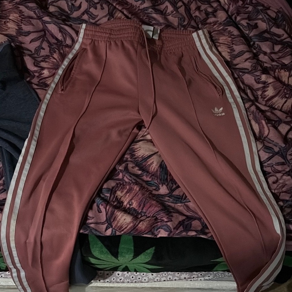 Adidas Pink Sweatpants with Three-Stripe Design